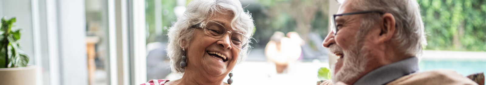 Mature couple laughing together